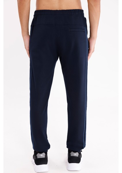 Yan Şerit Detaylı Esnek Bel Cepli Standart Kalıp Mevsimlik Örme Kumaş Eşofman Altı modelleri