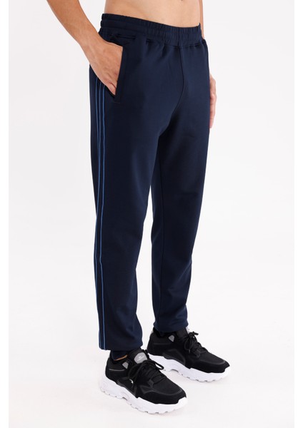 Yan Şerit Detaylı Esnek Bel Cepli Standart Kalıp Mevsimlik Örme Kumaş Eşofman Altı fırsatları