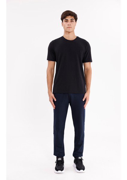 Yan Şerit Detaylı Esnek Bel Cepli Standart Kalıp Mevsimlik Örme Kumaş Eşofman Altı indirimleri