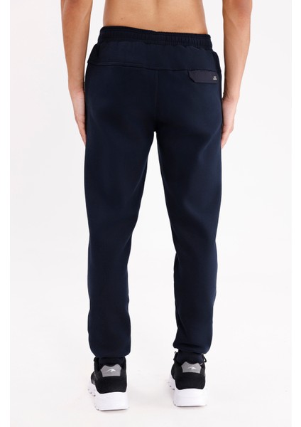 Esnek Bel Lastikli Yan Cepli Kapaklı Arka Cepli Tonal Logolu Rahat Kalıp Düz Paça Eşofman Altı modelleri