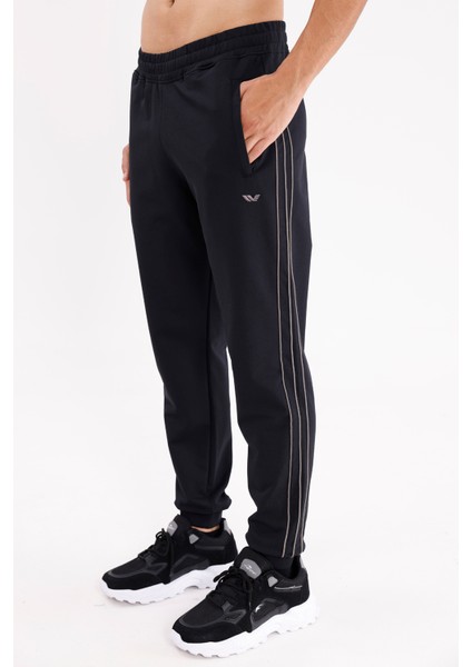 Yan Şerit Detaylı Esnek Bel Cepli Standart Kalıp Mevsimlik Örme Kumaş Eşofman Altı fiyatları