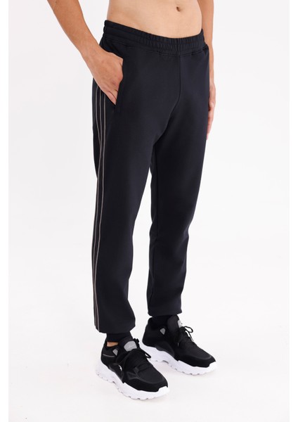 Yan Şerit Detaylı Esnek Bel Cepli Standart Kalıp Mevsimlik Örme Kumaş Eşofman Altı fırsatları