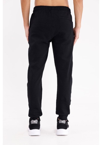 Petek Desenli Elastik Bel Yan Cepli Daralan Paça Spor Eşofman Altı modelleri