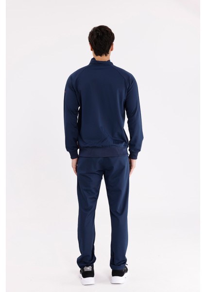 Şerit Detaylı Yüksek Yakalı Fermuarlı Cepli Lacoste Yüzeyli Eşofman Takımı modelleri