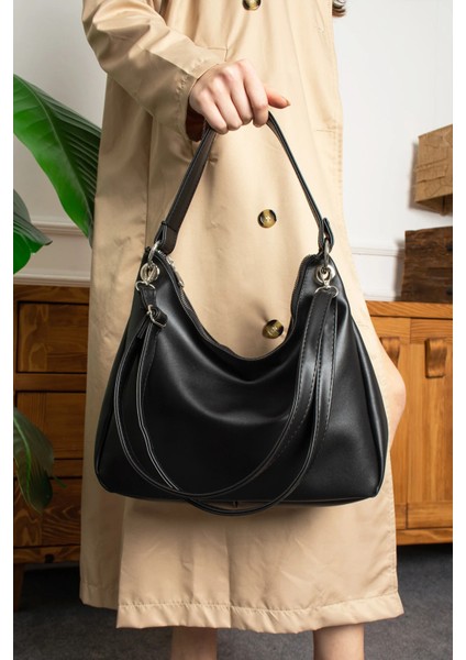 Kadın Halka Detaylı El ve Omuz Çantası – Şık ve Geniş Iç Hacimli fiyatları