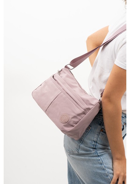 Sanmorris Glc Kadın 4009 Suya Dayanıklı Paraşüt Kumaş 5 Gözlü Siyah Renkli Çapraz Askılı El ve Omuz Çantası fırsatları