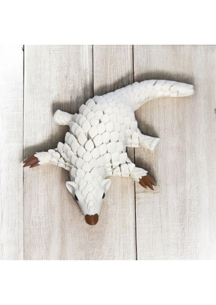 Fildişi Kıvrım – Çağdaş Pangolin Heykeli | Kabuk Factory Tasarımı fırsatları