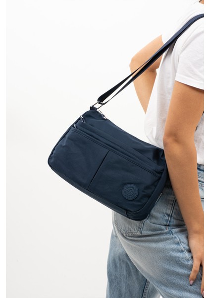 Sanmorris Glc Kadın 4009 Suya Dayanıklı Paraşüt Kumaş 5 Gözlü Siyah Renkli Çapraz Askılı El ve Omuz Çantası