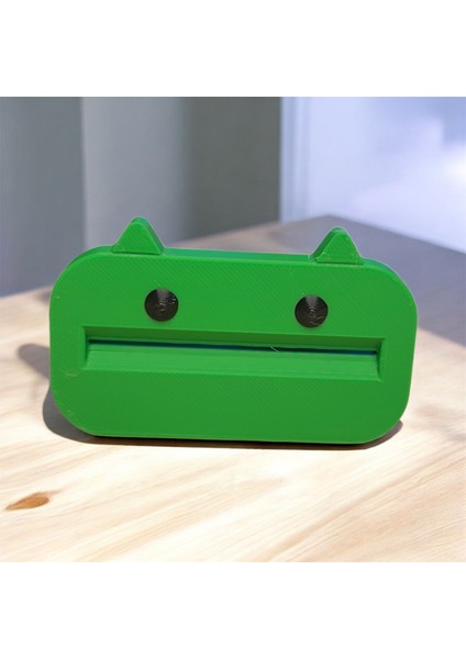 Yeşil Macun Canavarı” – Diş Macunu Sıkma Aparatı | Kabuk Factory Tasarımı