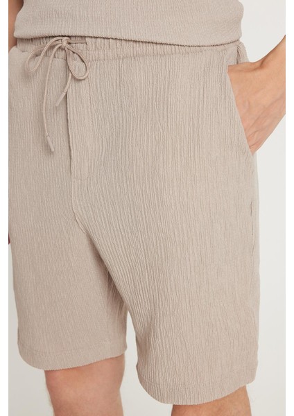 Erkek Oversize Geniş Kesim Bisiklet Yaka Gofre Kumaş Beli Bağcıklı Taş Renk Şort Takım modelleri