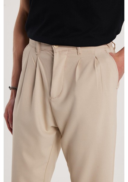 Erkek Regular Fit Çift Pileli Beli Lastikli Rahat Kesim Bol Paça Baggy Bej Pantolon