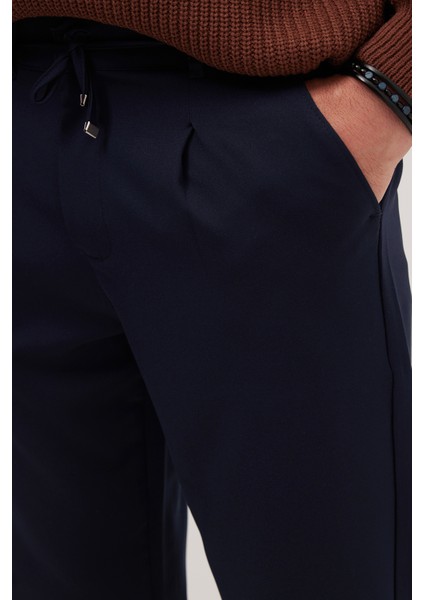 Erkek Slim Fit Dar Kesim Lastikli Bağcık Detaylı Lacivert Pantolon modelleri