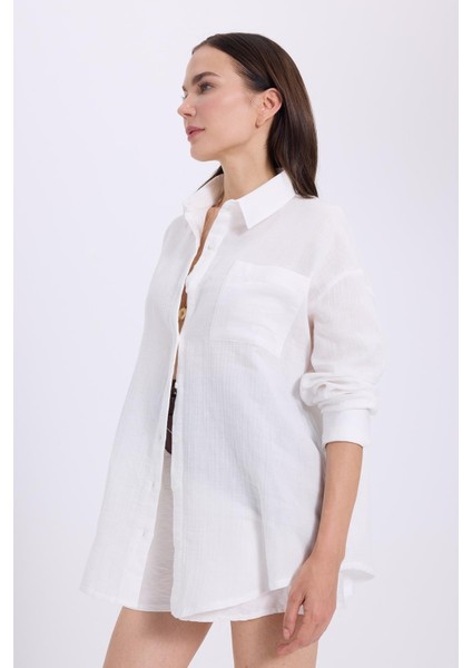 Kadın Oversize Geniş Kesim %100 Pamuk Müslin Kumaş Uzun Kollu Cepli Dokulu Beyaz Gömlek indirimleri