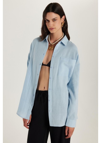 Kadın Oversize Geniş Kesim %100 Pamuk Müslin Kumaş Uzun Kollu Cepli Dokulu Mavi Gömlek fırsatları