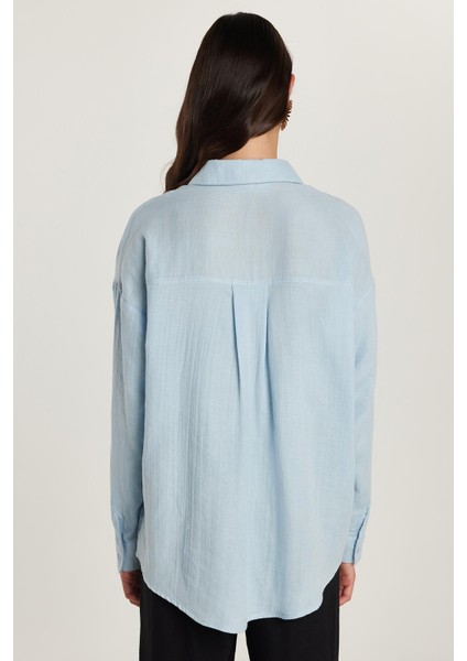 Kadın Oversize Geniş Kesim %100 Pamuk Müslin Kumaş Uzun Kollu Cepli Dokulu Mavi Gömlek indirimleri