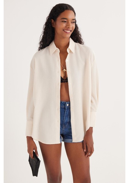 Kadın Oversize Geniş Kesim Bürümcük Pens Detaylı Uzun Kollu Dokulu Ekru Gömlek fırsatları
