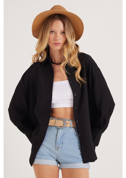 Kadın Oversize Geniş Kesim Bürümcük Pens Detaylı Uzun Kollu Dokulu Siyah Gömlek fiyatları