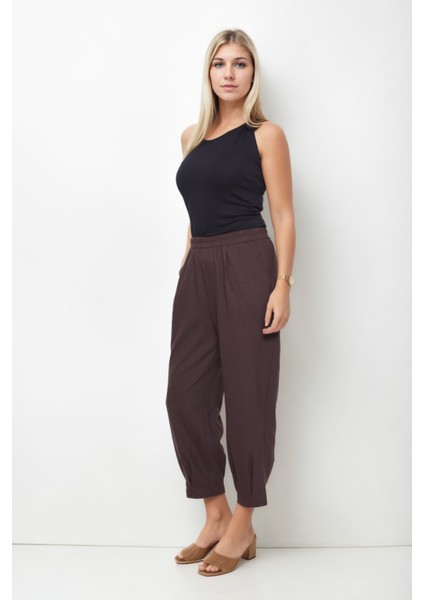 Beli Lastikli Paçası Pileli Pantolon fiyatları