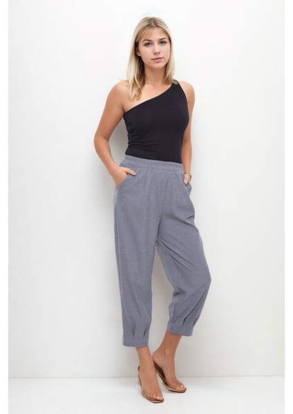 Beli Lastikli Paçası Pileli Pantolon fiyatları
