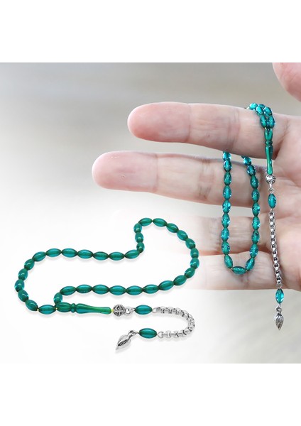 Ateş Kehribar Tesbih - Kararmaz Metal Püsküllü - Mini Boy - Şeffaf Turkuaz - Arpa Kesim fiyatları