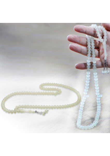 Kararmaz Metal Püsküllü Tekerlek Kesim Şeffaf Renk 99 Taneli Kedigözü Namaz Tesbihi fiyatları