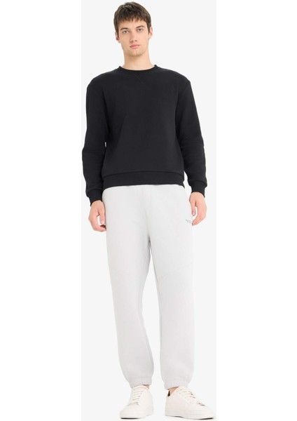 Regular Fit Beli Bağcıklı İçi Yumuşak Tüylü Paçası Lastikli Baskılı Fermuar Cepli Eşofman Altı