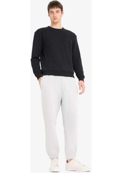 Regular Fit Beli Bağcıklı İçi Yumuşak Tüylü Paçası Lastikli Baskılı Fermuar Cepli Eşofman Altı