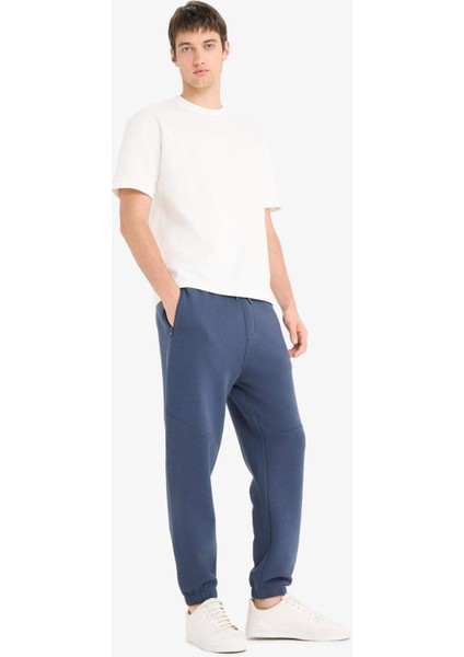 Regular Fit Beli Bağcıklı İçi Yumuşak Tüylü Paçası Lastikli Baskılı Fermuar Cepli Eşofman Altı