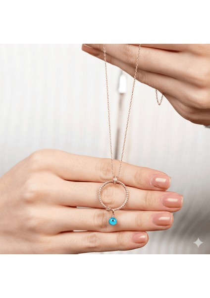 Beyaz Zirkon Taşlı Nazar Boncuğu Detaylı Dorika Top Süslemeli Rose Renk 925 Ayar Gümüş Kadın Kolye indirimleri