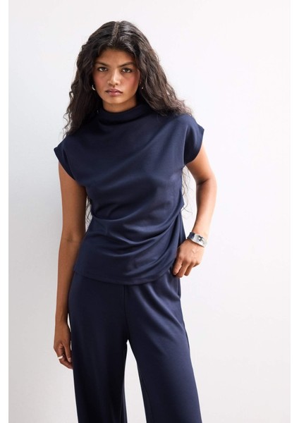 Slim Fit Dar Kesim Yarım Balıkçı Yaka Pike Kolsuz Bluz F7760AX25AU