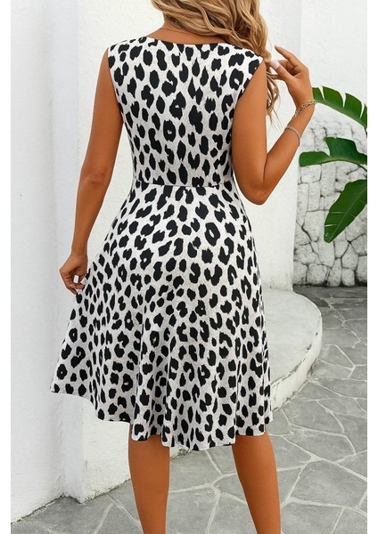 Kadın Sıfır Kollu Önden Çapraz Detaylı Leopar Desenli Süprem Elbise fiyatları