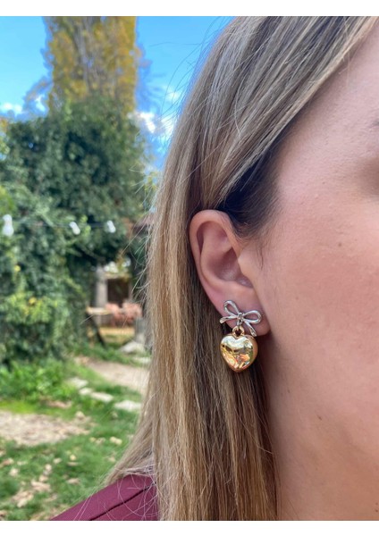 Kalpli Fiyonk Detaylı Çelik Küpe fiyatları