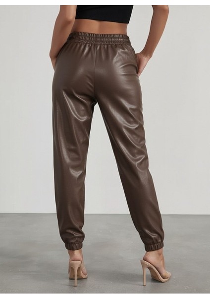 Kadın Yüksek Bel Lastikli Önü Düğmeli Deri Pantolon modelleri