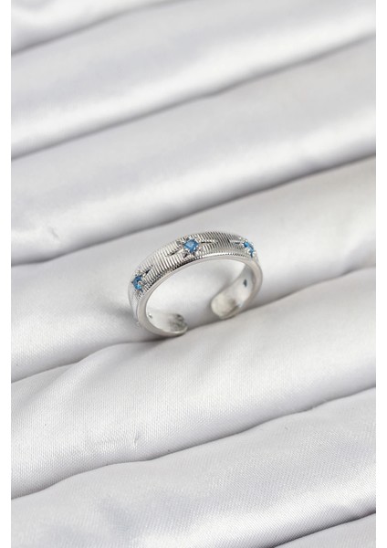 Pirinç Gümüş Renk Mavi Zirkon Taşlı Kutup Yıldızı Model Kadın Yüzük