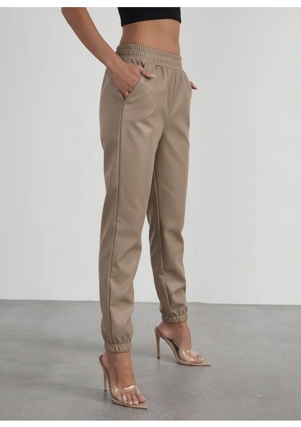 Kadın Yüksek Bel Lastikli Önü Düğmeli Deri Pantolon modelleri