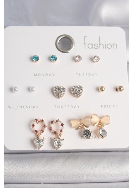 Pirinç Gold Renk Zirkon Taşlı Kalp Beyaz Mineli Fiyonk Figür 7 Çift Kadın Küpe Seti