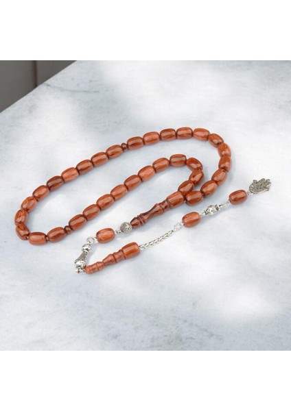 Burhan sağlam Kapsül Kesim 12x9 mm Sıkma Kehribar Alpaka Püsküllü Tesbih indirimleri