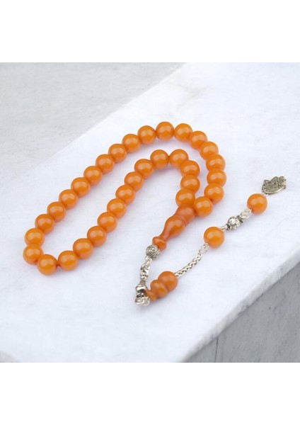 Burhan sağlam Küre Kesim 10x10 mm Sıkma Kehribar Alpaka Püsküllü Tesbih indirimleri