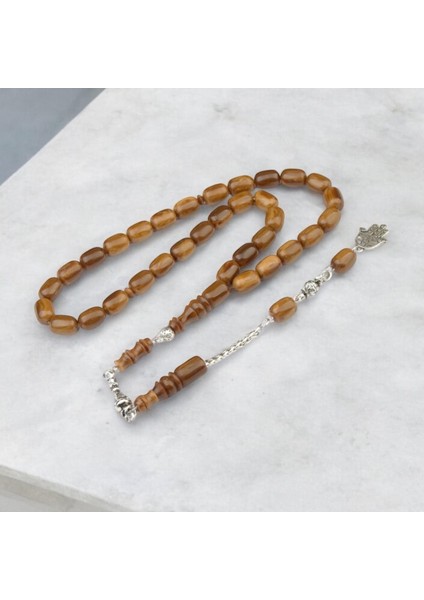 Burhan sağlam Kapsül Kesim 11x8 mm Sıkma Kehribar Alpaka Püsküllü Tesbih indirimleri