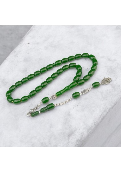 Burhan sağlam Kapsül Kesim 12x9 mm Sıkma Kehribar Alpaka Püsküllü Tesbih indirimleri