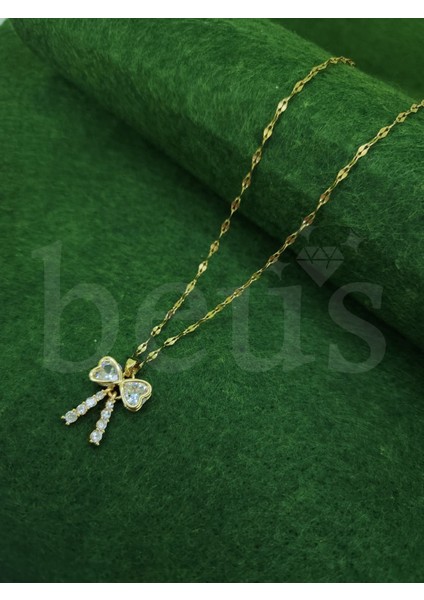 - Zirkon Taşlı Damla Detaylı Gold Kaplama Çelik Fiyonk Kolye