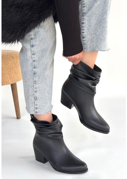 Lukana Siyah Cilt Topuklu Körüklü Bot fiyatları