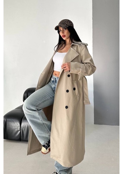 Kadın Trençkot Uzun Suni Deri Kemerli Düğmeli Cepli Yırtmaçlı Kruvaze Yaka Trençkot modelleri