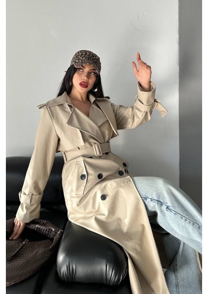 Kadın Trençkot Uzun Suni Deri Kemerli Düğmeli Cepli Yırtmaçlı Kruvaze Yaka Trençkot indirimleri