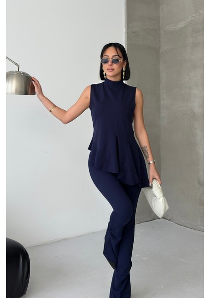 Kadın Alt Üst Takım Sıfır Kollu Balıkçı Yaka Fırfırlı Asimetrik Bluz Ispanyol Paça Büzgülü Pantolon Ikili Takım