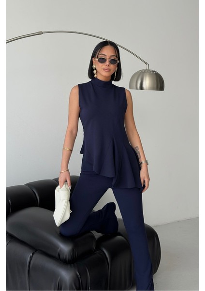 Kadın Alt Üst Takım Sıfır Kollu Balıkçı Yaka Fırfırlı Asimetrik Bluz Ispanyol Paça Büzgülü Pantolon Ikili Takım fiyatları