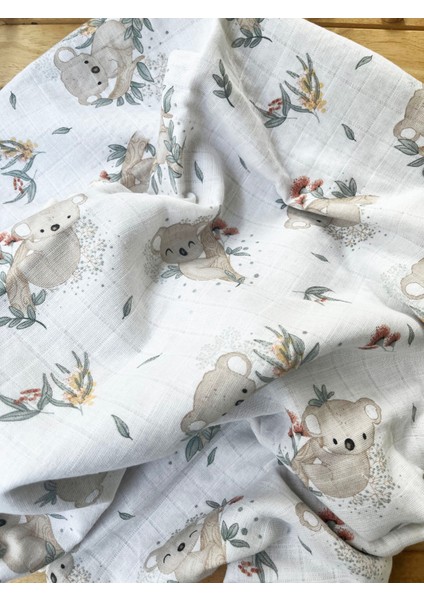 Ön Tarafı Müslin Arka Tarafı Vafıl Kumaş Kenarları Ponponlu Koala Desenli Çift Katlı Battaniye indirimleri