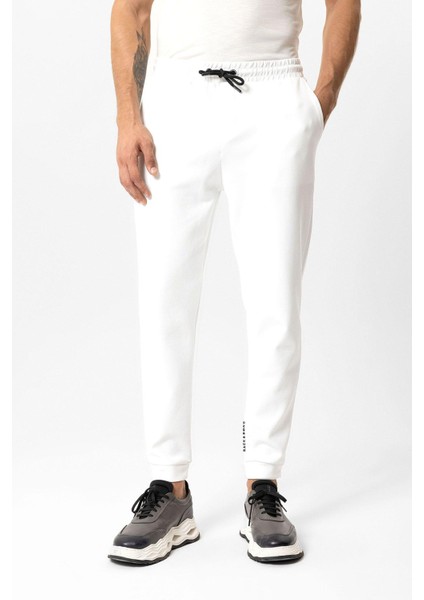 Beyaz Regular Fit Pamuklu Beli Bağlamalı Jogger Pantolon fiyatları