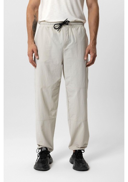 Bej Relaxed Fit Beli Lastikli Jogger Pantolon fiyatları