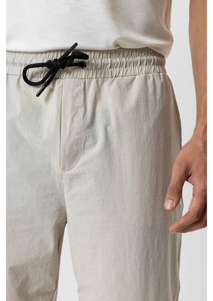 Bej Relaxed Fit Beli Lastikli Jogger Pantolon fırsatları